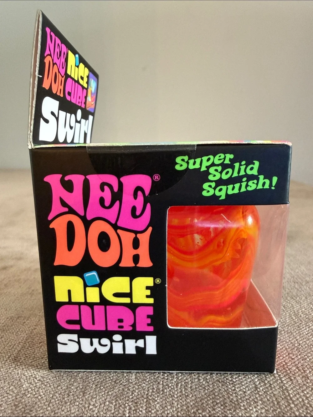 NeeDoh Nice Cube Swirl Super Solid Squish! - Orange